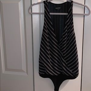 Bebe low cut from striped body suit.